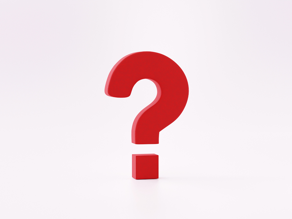 Red question mark with white background representing electrical repair FAQs.