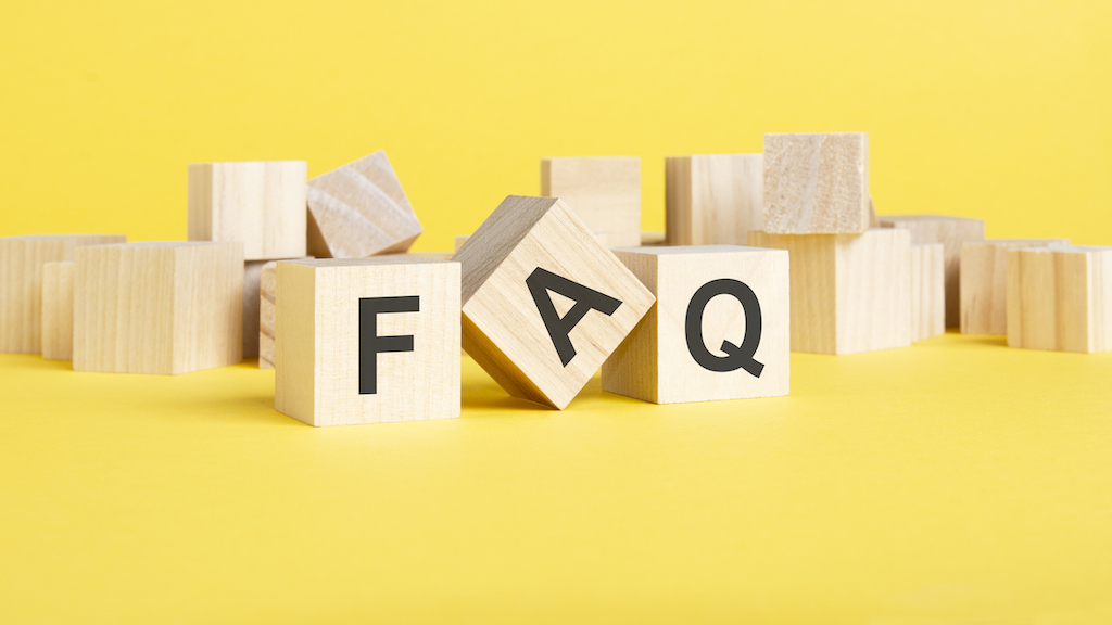 FAQ wooden blocks on yellow background, | Residential Electrician Services