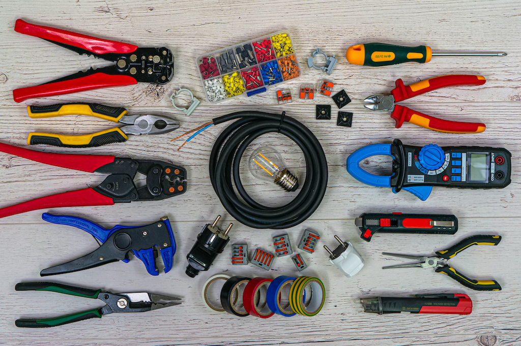 Table full of electrical tools that a general electrician uses.
